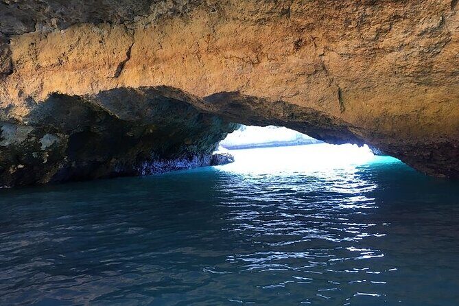 Benagil - Caves & Coast - Algarve Cave Captain - The toast on board: champagne or soda in a very scenic setting
